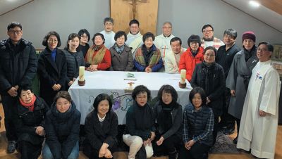 Fr. Thomas with parishioners